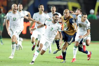 Riyad Mahrez wheels away in celebration after scoring the last-minute goal that sent Algeria threw to the final of the 2019 Africa Cup of Nations. EPA