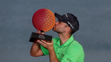RAS AL KHAIMAH, UNITED ARAB EMIRATES - FEBRUARY 05: Daniel Gavins of England poses with the Ras Al Khaimah Championship trophy on Day Four of the Ras Al Khaimah Championship at Al Hamra Golf Club on February 05, 2023 in Ras al Khaimah, United Arab Emirates. (Photo by Warren Little / Getty Images)