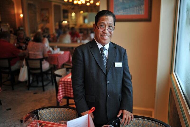 Salvador Toriano, better known as Buddy, is the supervisor at Le Beaujolais in the Mercure Centre Hotel on Hamdan Street. Delores Johnson / The National