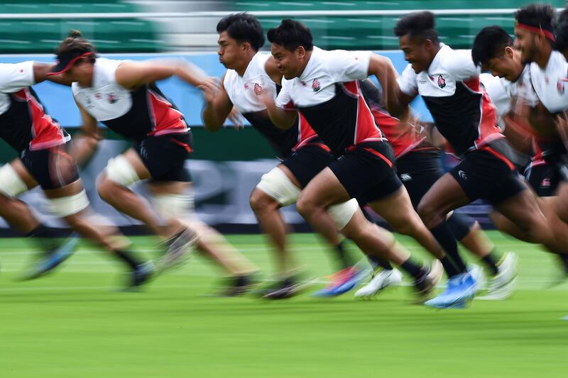 Japan's players takes part in a captain's run training session at Shizuoka Stadium Ecopa in Shizuoka on the eve of their Japan 2019 Rugby World Cup Pool A match against Ireland. AFP