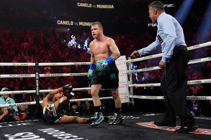 Canelo Alvarez after knocking  down Jaime Munguia. AP