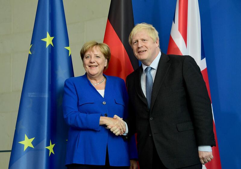 epa07784446 German Chancellor Angela Merkel (L) shakes hands British Prime Minister Boris Johnson after a joint statement at the Chancellery in Berlin, Germany, 21 August 2019. Prior to the G7 summit in Biarritz form 24 to 27 August 2019, Johnson meets Angela Merkel and on the next day French President Emmanuel Macron. In the talks, Johnson is expected to try to resume the Brexit talks, so that it will not come to a 'no deal' exit of the United Kingdom from the EU on 31 October 2019.  EPA/CLEMENS BILAN