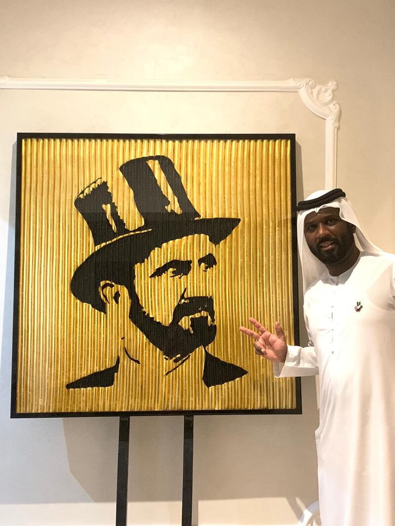 The artist Abdulrauf Khalfan with his latest project, a portrait of Dubai ruler Sheikh Mohammed. All images courtesy of Abdulrauf Khalfan