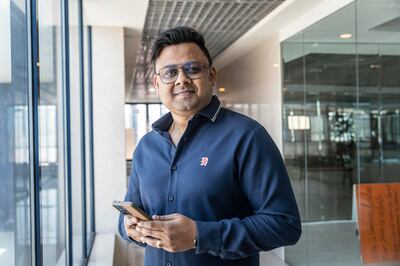 Abhijeet Bhose uses finance apps to remit money to his home country, for credit card payments, insurance payments and local money transfers. Antonie Robertson / The National


