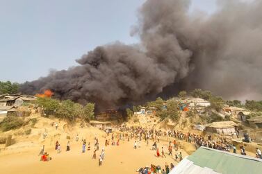 A fire breaks out at a Balukhali refugee camp in Cox's Bazar, Bangladesh, on March 22, 2021. Reuters