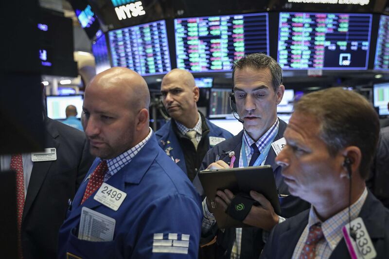 NEW YORK, NY - AUGUST 19: Traders and financial professionals work on the floor of the New York Stock Exchange (NYSE) at the opening bell on August 19, 2019 in New York City. The Dow Jones Industrial Average traded over 300 points higher at the open on Monday morning.   Drew Angerer/Getty Images/AFP
== FOR NEWSPAPERS, INTERNET, TELCOS & TELEVISION USE ONLY ==
