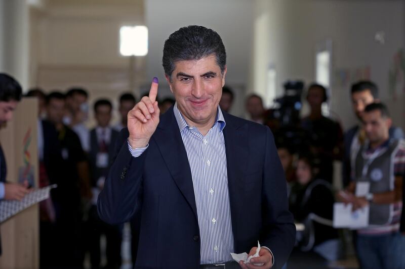 epa07058182 Prime Minister of Iraqi Kurdistan Nechirvan Barzani shows his ink-marked finger after casting his vote for the Kurdistan parliamentary election at a polling station in Erbil, the capital of the Kurdistan Region in Iraq, 30 September 2018.  EPA/GAILAN HAJI