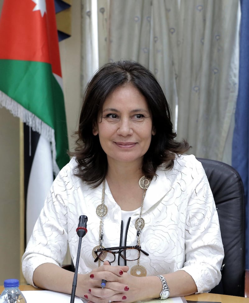 This photo taken on July 8, 2018 shows Jordan's Minister of Energy and Mineral Resources Hala Zawati at her office in Amman. - Jordan imports nearly 98 percent of its energy supply, and has long relied on gas, heavy fuel oil and diesel to run its power plants. But a government plan to make clean energy 20 percent of the kingdom's overall power consumption by 2020 has seen alternative energy projects skyrocket in recent years. (Photo by Khalil MAZRAAWI / AFP)