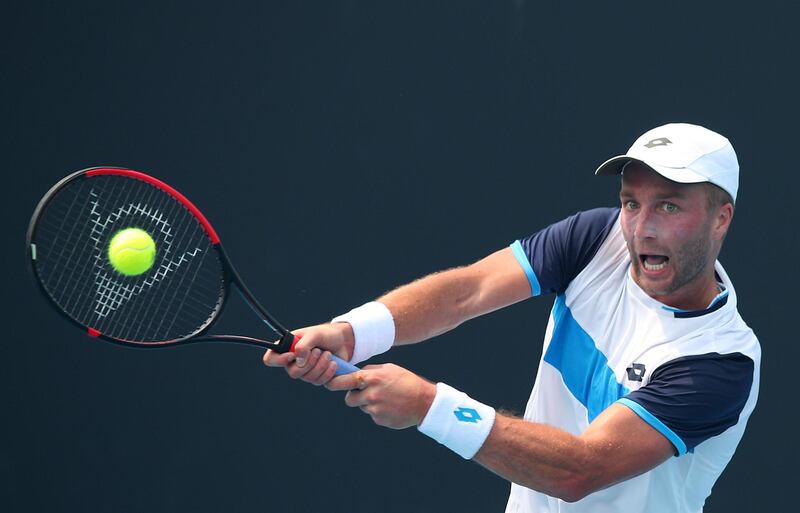 MELBOURNE, AUSTRALIA - JANUARY 14: Liam Broady of Great Britain plays a backhand in his match against Ilya Ivashka of Belarus during 2020 Australian Open Qualifying at Melbourne Park on January 14, 2020 in Melbourne, Australia. (Photo by Graham Denholm/Getty Images)