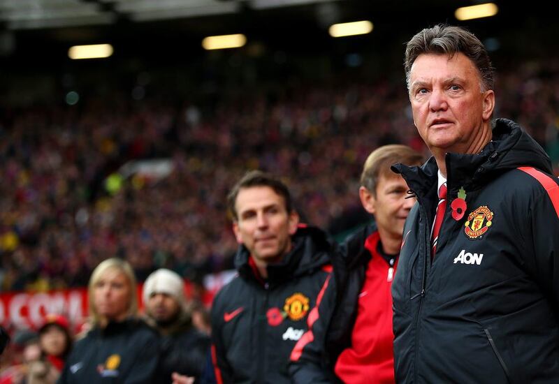 Manchester United manager Louis van Gaal, right, looks on prior to the English Premier League match against Crystal Palace at Old Trafford on November 8, 2014, in Manchester, England. Clive Rose / Getty Images