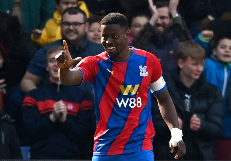 Crystal Palace's Marc Guehi celebrates scoring the first goal. Reuters