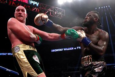 Tyson Fury, left, is eager to have a rematch with Deontay Wilder, but the question is when. Andrew Couldridge / Reuters