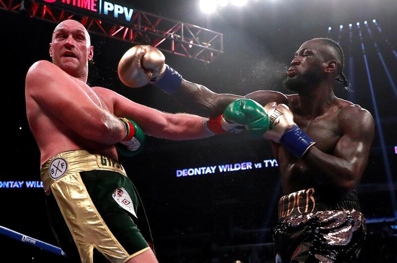FILE PHOTO: Boxing - Deontay Wilder v Tyson Fury - WBC World Heavyweight Title - Staples Centre, Los Angeles, United States - December 1, 2018  Deontay Wilder in action against Tyson Fury  Action Images via Reuters/Andrew Couldridge/File Photo