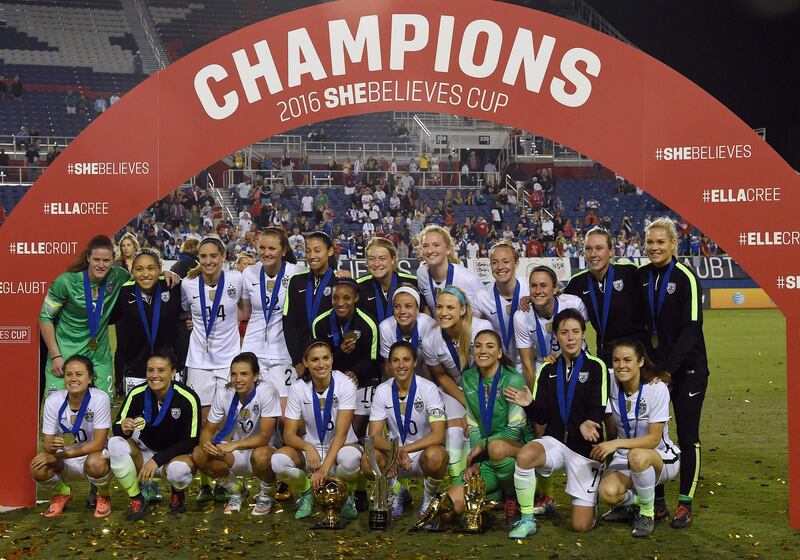 The US women's national team celebrates winning the SheBelieves Cup soccer tournament in Boca Raton, Florida. AFP