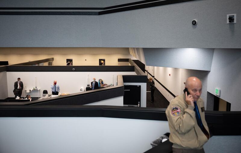 Nasa management are seen on a teleconference in firing room four following the attempted launch of a SpaceX Falcon 9 rocket.  EPA