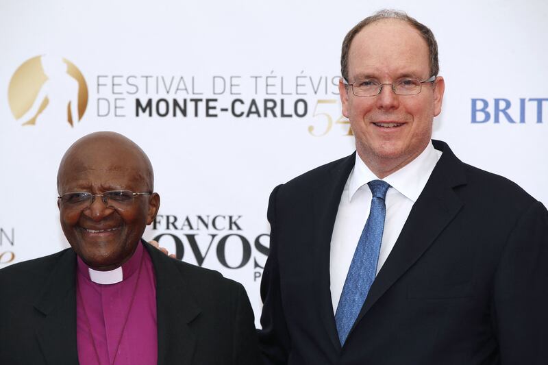 The archbishop with Prince Albert II of Monaco in 2014. AFP