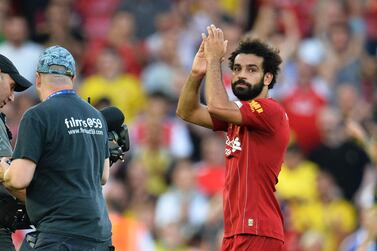 epa07791378 Liverpool's Mohamed Salah (R) reacts after the English Premier League soccer match between Liverpool FC and Arsenal FC at Anfield in Liverpool, Britain, 24 August 2019. EPA/PETER POWELL EDITORIAL USE ONLY. No use with unauthorized audio, video, data, fixture lists, club/league logos or 'live' services. Online in-match use limited to 120 images, no video emulation. No use in betting, games or single club/league/player publications