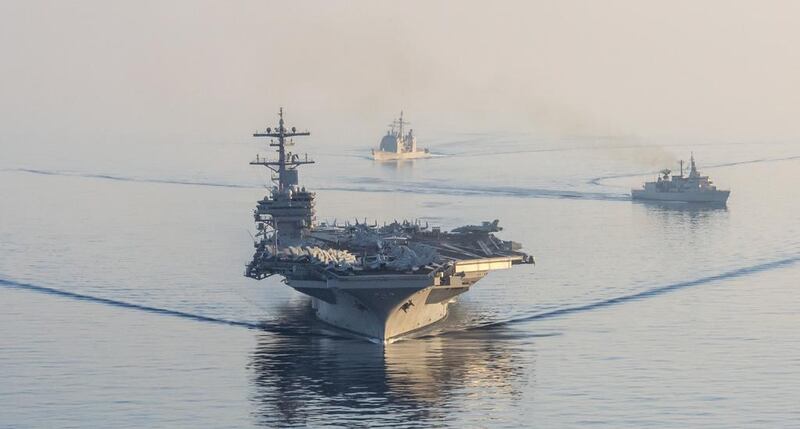 The USS George HW Bush performs a passing exercise in the Mediterranean Sea on March 5, 2017 with the guided-missile cruiser USS Philippine Sea and the Greek navy’s Elli-class frigate HN Kountouriotis. Courtesy Mass Communication Specialist 3rd Class Michael B Zingaro / US navy