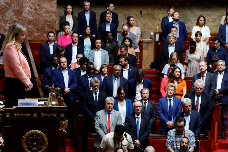 Yael Braun-Pivet, President of the National Assembly, and members of parliament take part in a minute of silence after the knife attack, in Paris. Reuters