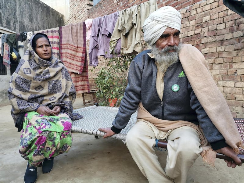 Balbir Singh, 62, and Kulwant Kaur at their home in Rauni village in Ludhiana. Mr Singh has returned home for two days after protesting for 50 days at Singhu border near Delhi against the new farm laws. Taniya Dutta for The National