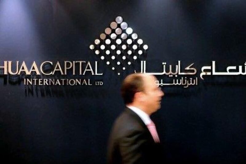 Shuua Capital announced losses for the third quarter of Dh156.2 million (US$42.5m) on Thursday, down from a profit of Dh190,000 during the same period last year. Andrew Parsons / Bloomberg News