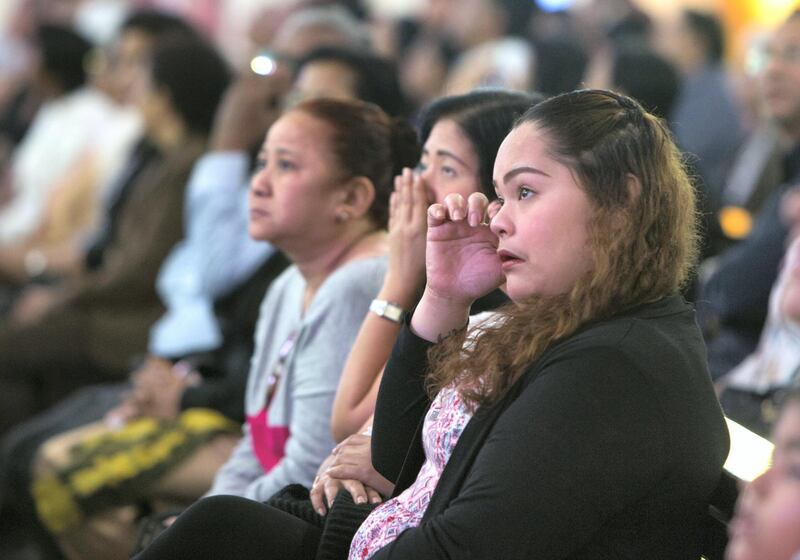 DUBAI, UNITED ARAB EMIRATES - Worshippers are emotional upon seeing the Pope on the screen at St. Mary's Church, Oud Mehta.  Leslie Pableo for The National for Nick Webster's story