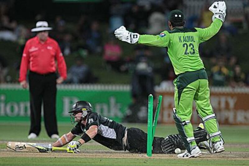 Scott Styris is ran out by Younus Khan (not pictured) during New Zealand's collapse to a 41-run defeat to Pakistan.
