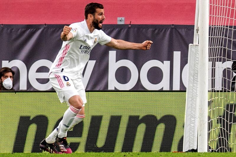 Real Madrid's Nacho Fernandez celebrates with teammates after scoring. EPA