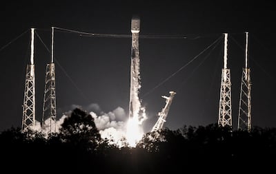 A SpaceX Falcon 9 rocket carrying 48 Starlink internet satellites takes off. AP