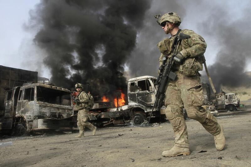 Nato soldiers, such as these pictured in Torkham area near the Pakistan-Afghanistan in 2014, help train and advise Afghan forces. Reuters