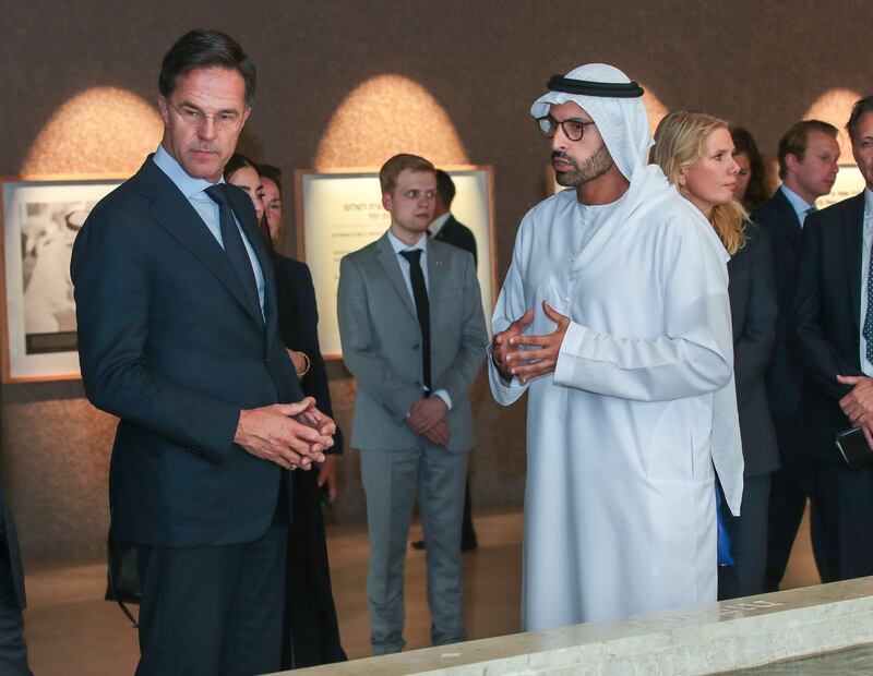 Mr Al Mubarak speaks with the Dutch Prime Minister. Victor Besa / The National
