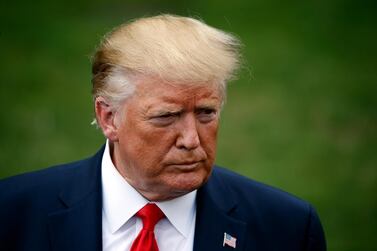 President Donald Trump listens to a question as he speaks with reporters at the White House, Monday, September 9, 2019, in Washington. Mr Trump called off peace talks with the Taliban after an attack that killed an American soldier. AP