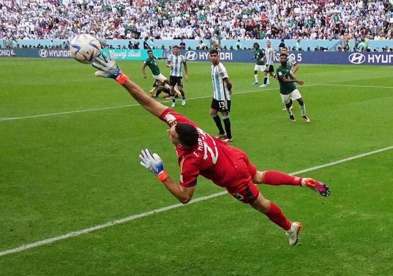 Argentina goalkeeper Emiliano Martinez fails to stop Salem Al Dawsari's strike for Saudi Arabia hitting the back of the net during the World Cup Group C match at Lusail Stadium, on November 22, 2022. Reuters