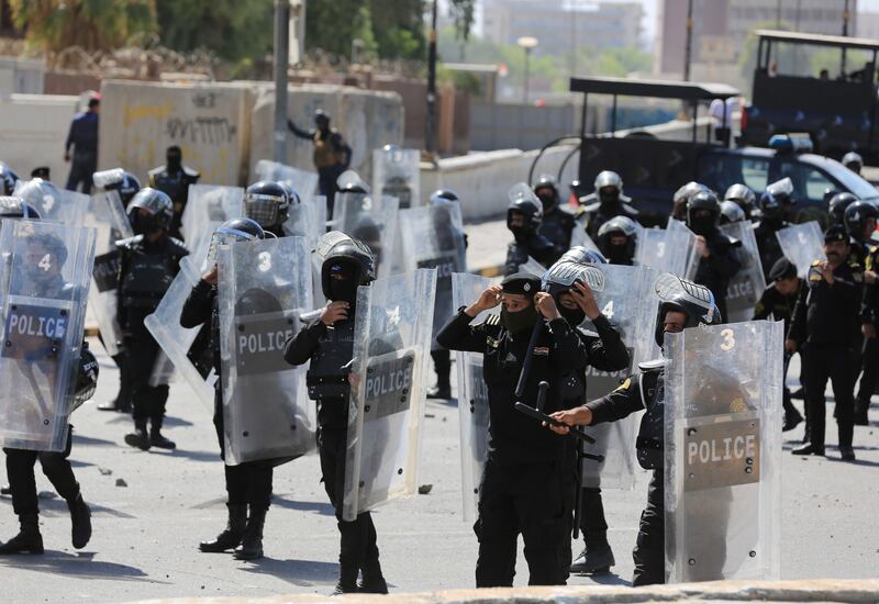 Riot police officers in Tahrir Square. EPA 