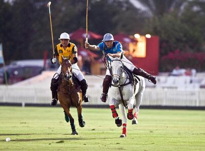 United Arab Emirates - Ghantoot - April 9, 2010:

SPORTS: With Ghantoot's Hugo Aberto Barabucci, left, on his heels, Al Basti's Matias Colombres, right, goes to score the team's last goal during the President's Cup Polo Final at the Ghantoot Racing & Polo Club in Ghantoot on Friday, April 9, 2010. Ghantoot won 7-5. Amy Leang/The National