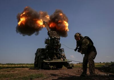 A Ukrainian serviceman fires a self-propelled howitzer towards Russian troops at a position near the city of Bakhmut. Reuters