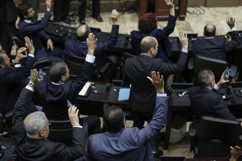 Lawmakers vote for the new President of the National Assembly at the Federal Legislative Palace in Caracas, Venezuela, on Saturday, Jan. 5, 2019. A group of 12 Latin American nations plus Canada urged Venezuela's leader to hand power to the opposition-controlled National Assembly and call new elections, stepping up pressure on Nicolas Maduro days before he's due to start a new term. Photographer: Marco Bello/Bloomberg