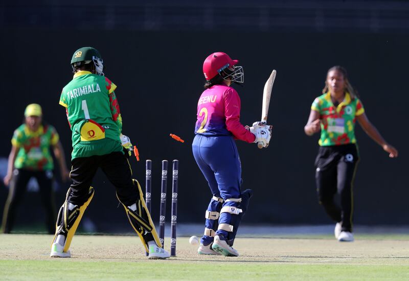 UAE batter Heena Hotchandani is bowled by Vanuatu's Nasimana Navaika for 11