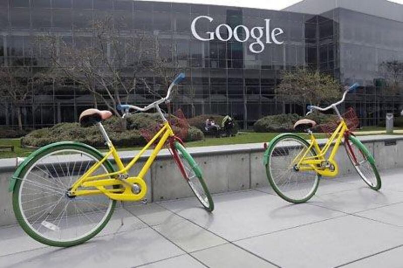 Google is vying with competitors as it bids to attract talented software developers by offering incentives such as campus bicycles. Jeff Chiu / AP Photo
