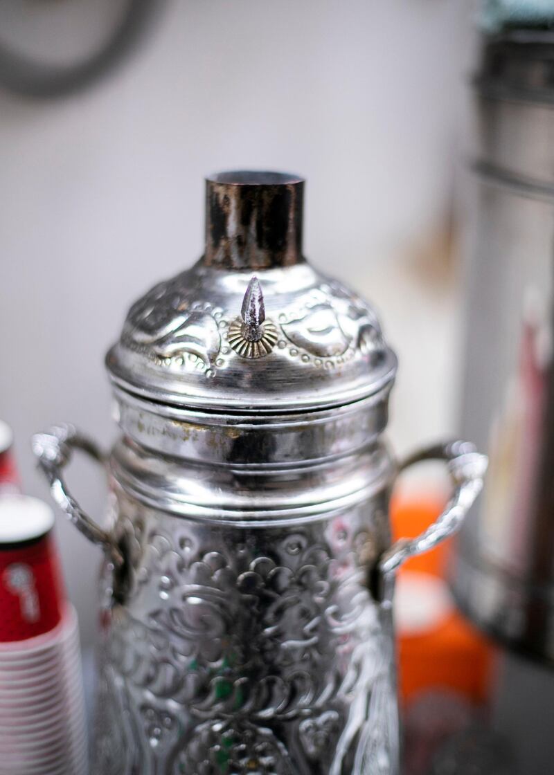 DUBAI, UNITED ARAB EMIRATES.  7 FEBRUARY 2021. 
Hussain Al Khawali runs his coffee stall in Al Sabkha. 
He's been in the same neighborhood, serving coffee to the community, for 40 years. 
Photo: Reem Mohammed / The National
Reporter: