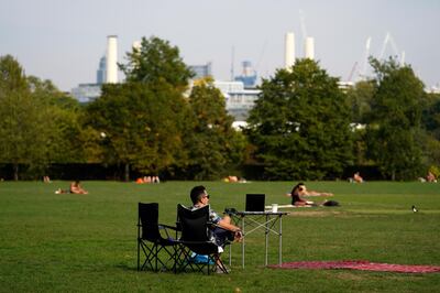 epa08670672 Members of the public in Battersea Park,  Central London, Britain, 15 September 2020. It is reported that UK will experience a rise in temperatures for the next few days.  EPA/WILL OLIVER