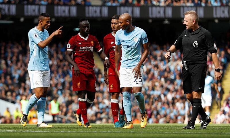 Soccer Football - Premier League - Manchester City vs Liverpool - Manchester, Britain - September 9, 2017   Liverpool's Sadio Mane is sent off by referee Jon Moss   Action Images via Reuters/Lee Smith  EDITORIAL USE ONLY. No use with unauthorized audio, video, data, fixture lists, club/league logos or "live" services. Online in-match use limited to 75 images, no video emulation. No use in betting, games or single club/league/player publications. Please contact your account representative for further details.