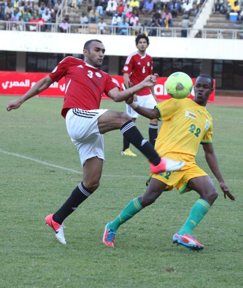 Egypt defender Ahmed Elmohamady, left. Tsvangirayi Mukwazhi / AP Photo