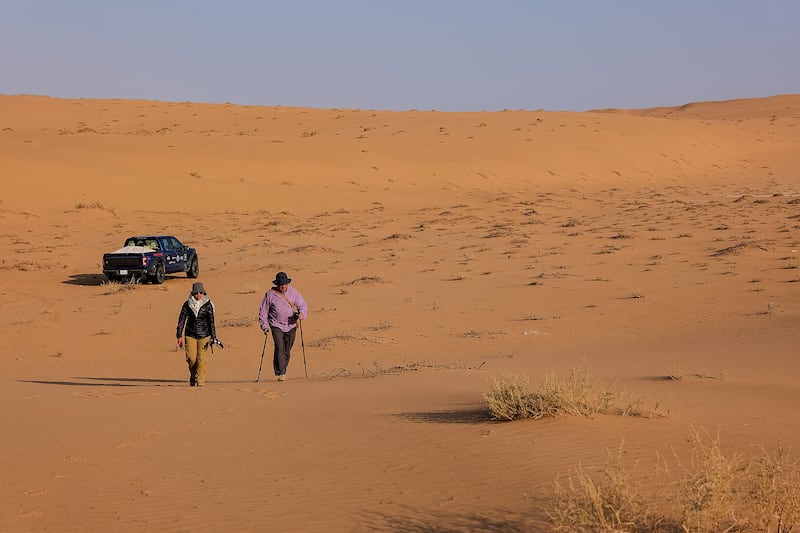 Reem Philby and Mark Evans set out on another day's trekking