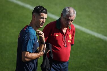 Cristiano Ronaldo of Portugal and Portugal's head coach Fernando Santos (R) during a training session at Cidade do Futebol in Oeiras, outskirts of Lisbon, Portugal, 21 September 2022.  Portugal will play against the Czech Republic on 24 September in Prague for the upcoming UEFA Nations League.   EPA / RODRIGO ANTUNES