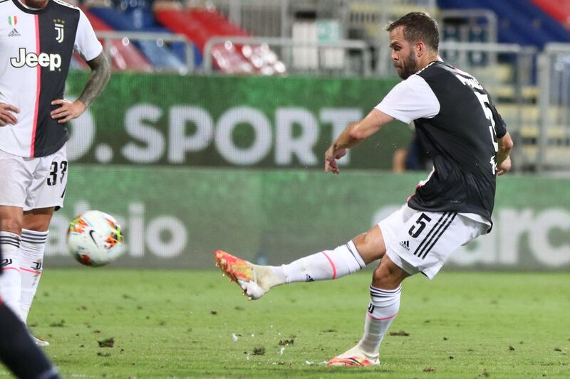 Juventus' Miralem Pjanic takes a shot at goal. EPA