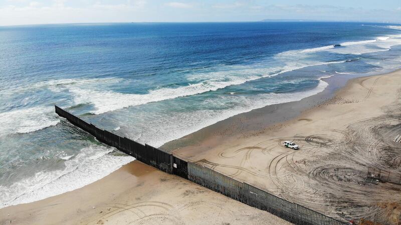 An aerial view of the beach on the Mexican side of the U.S.-Mexico border barrier in Tijuana, Mexico. Getty Images