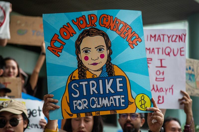 People protest in front of the Ministry of Natural Resources and Environment in Bangkok, Thailand. Getty Images