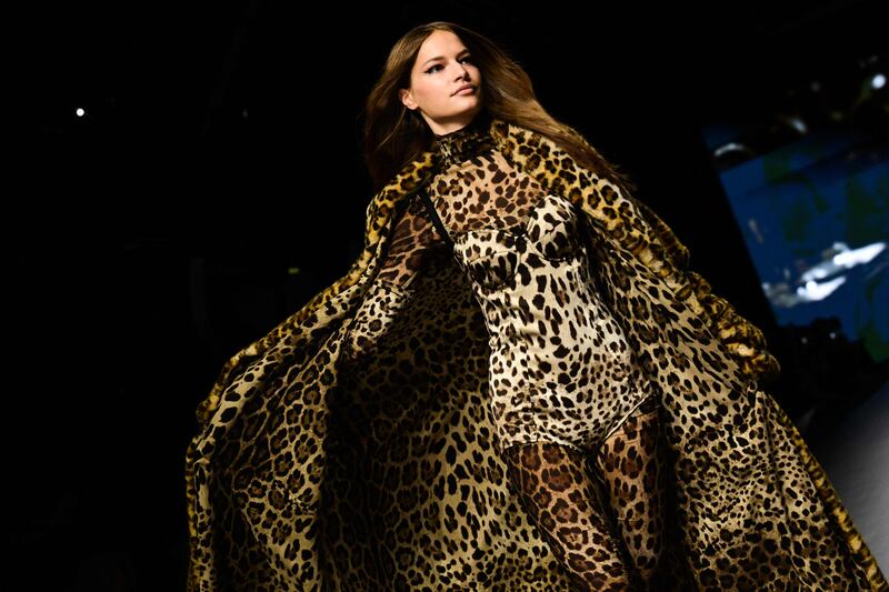 A model presents another leopard-print creation. AFP