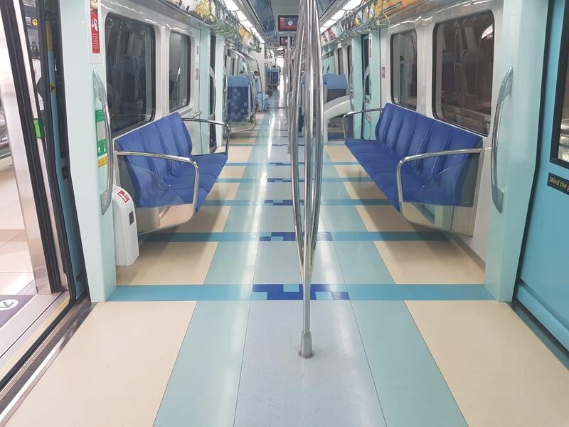 An eerily empty scene onboard a Dubai Metro journey on Wednesday morning. Patrick Ryan / The National 